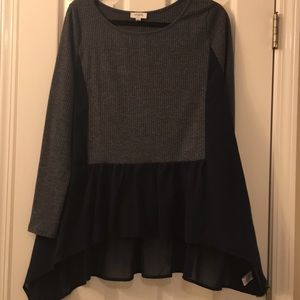 Tunic navy 2 tone with shear side and ruffle. M.
